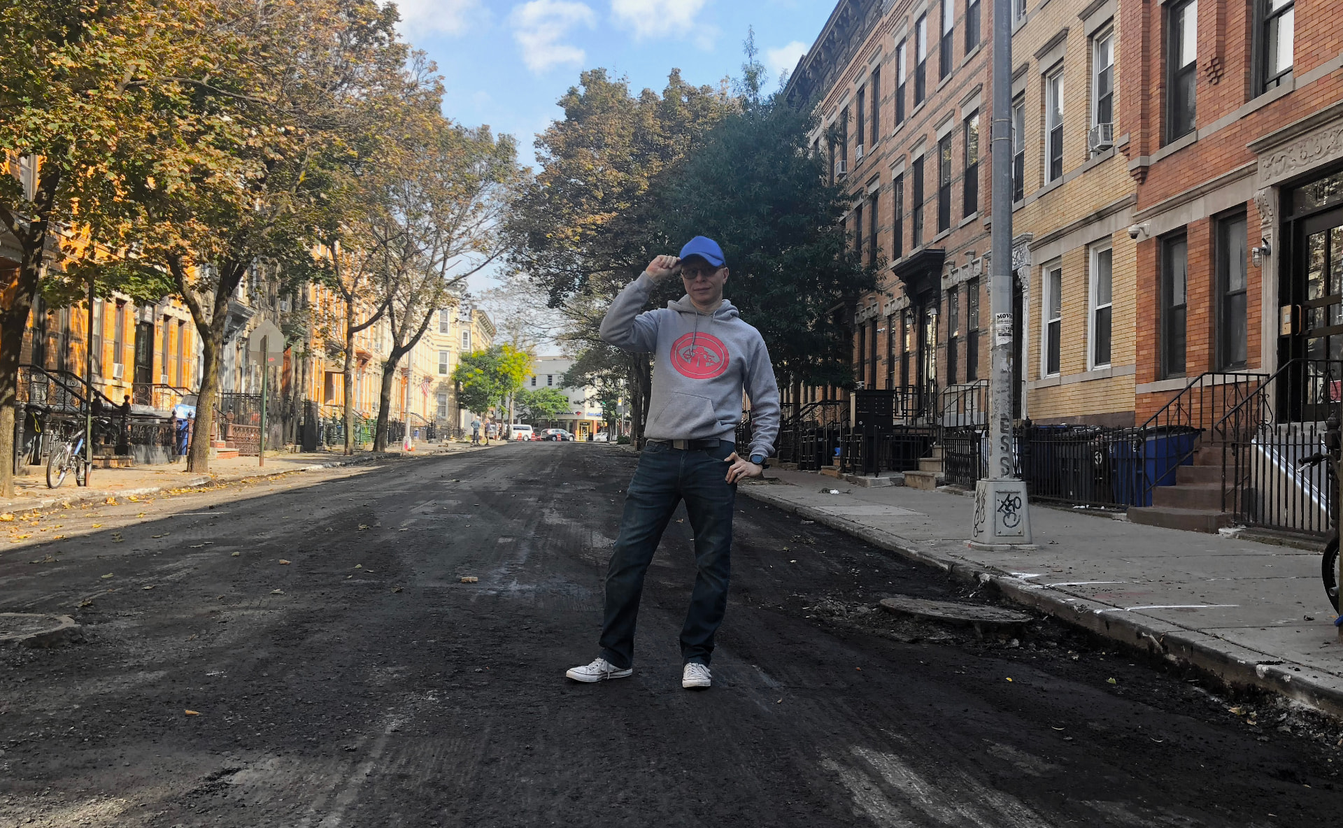 Victor Varnado standing in the middle of a Brooklyn street